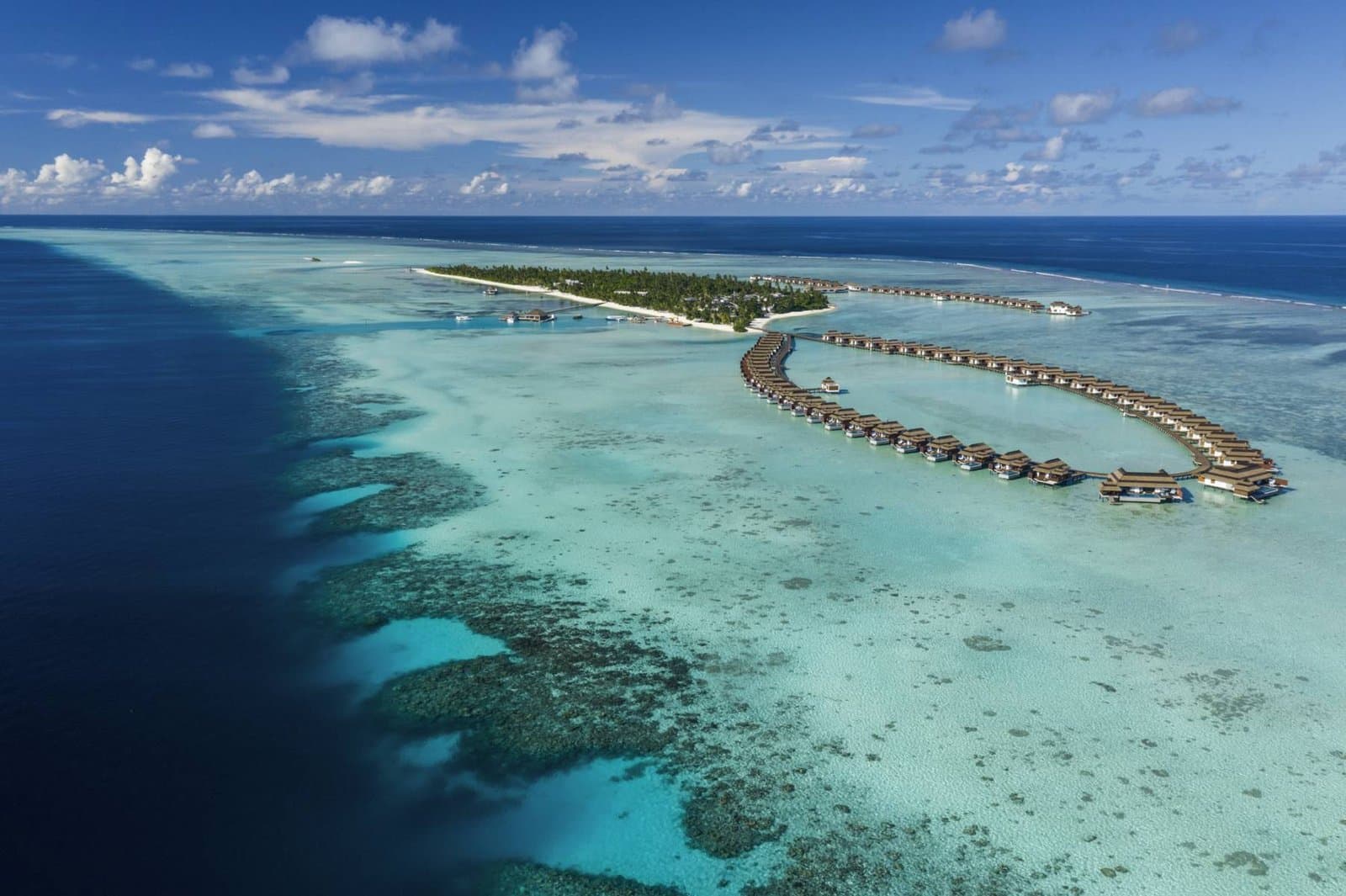 Pullman Maldives Maamutaa - 5-star resort in Gaafu Alifu Atoll featuring pristine beaches, crystal-clear lagoon, and overwater villas