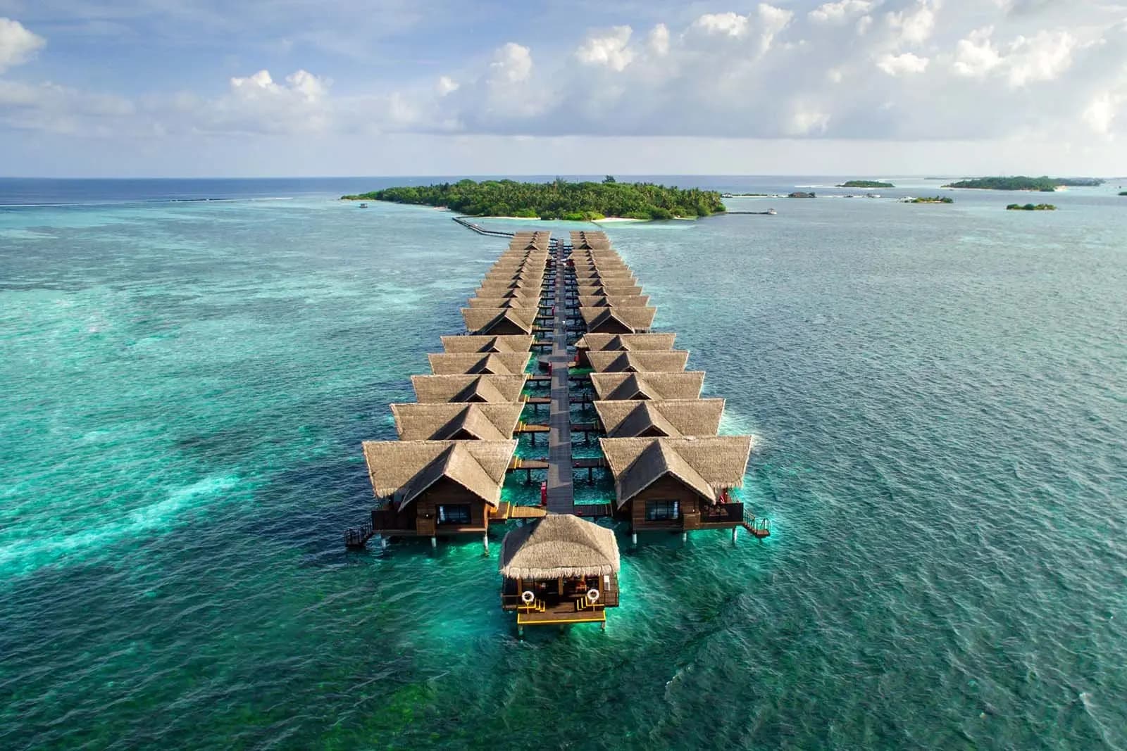 Adaaran Select Hudhuran Fushi - 5-star resort in North Malé (Kaafu Atoll) featuring pristine beaches, crystal-clear lagoon, and overwater villas